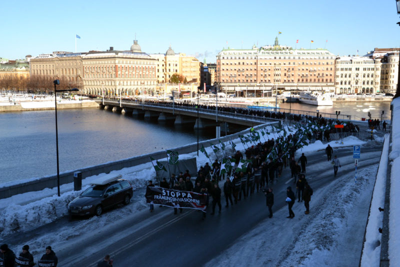 The demonstration march past the Royal Palace and approach the Parliament building. Photo: FWM